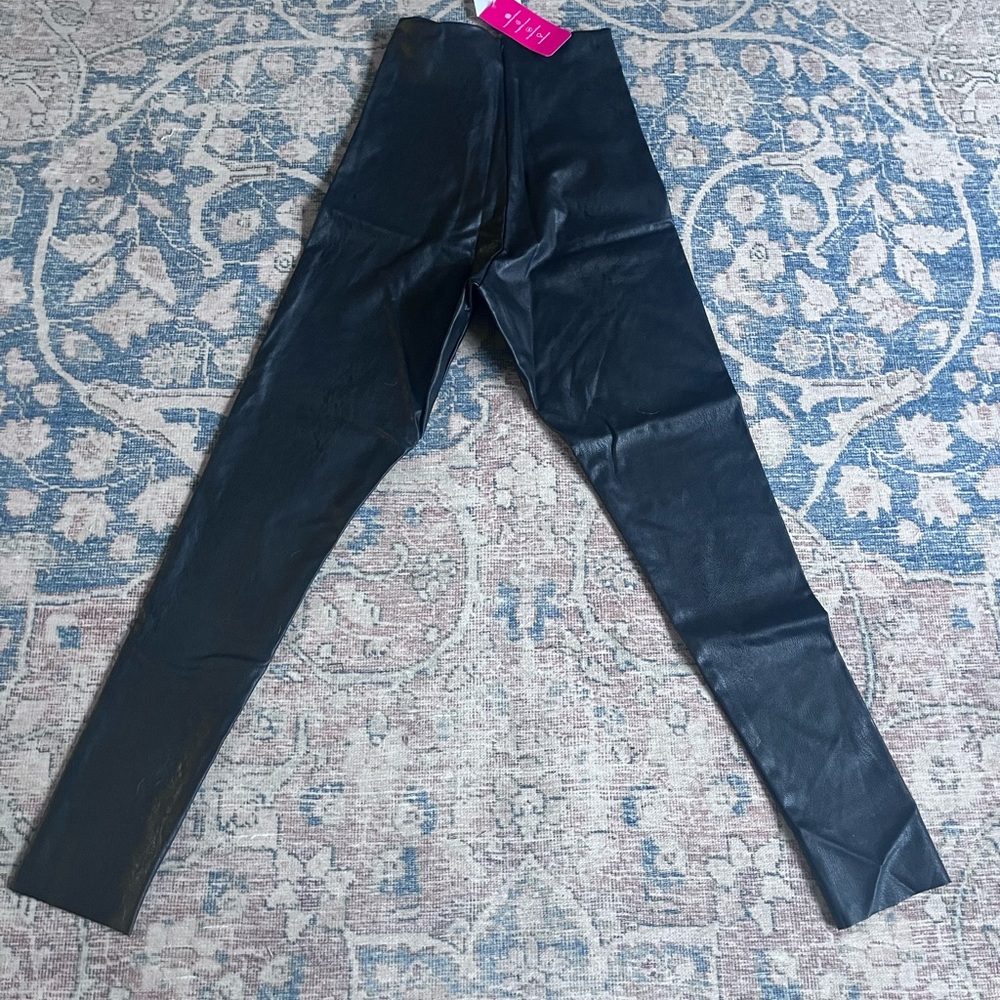 Black commando leather style leggings.